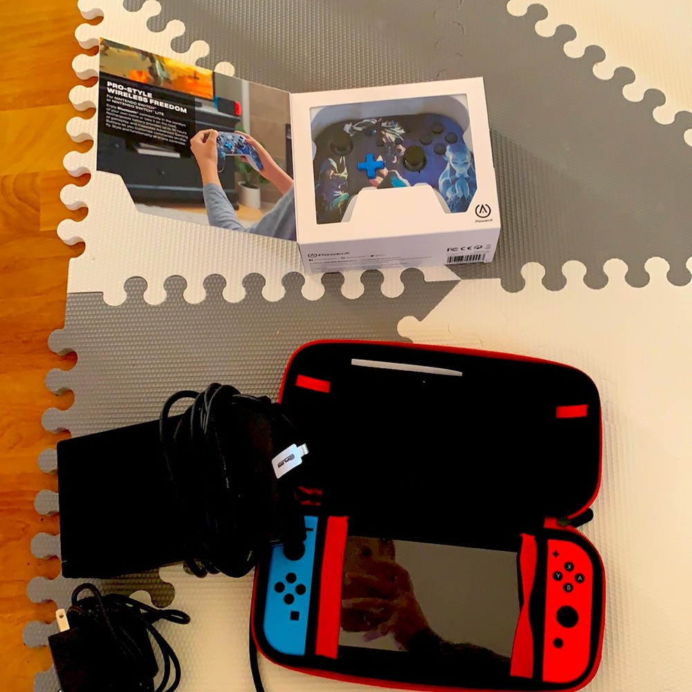 Nintendo Switch with Travel Case, Controller, and Adaptor